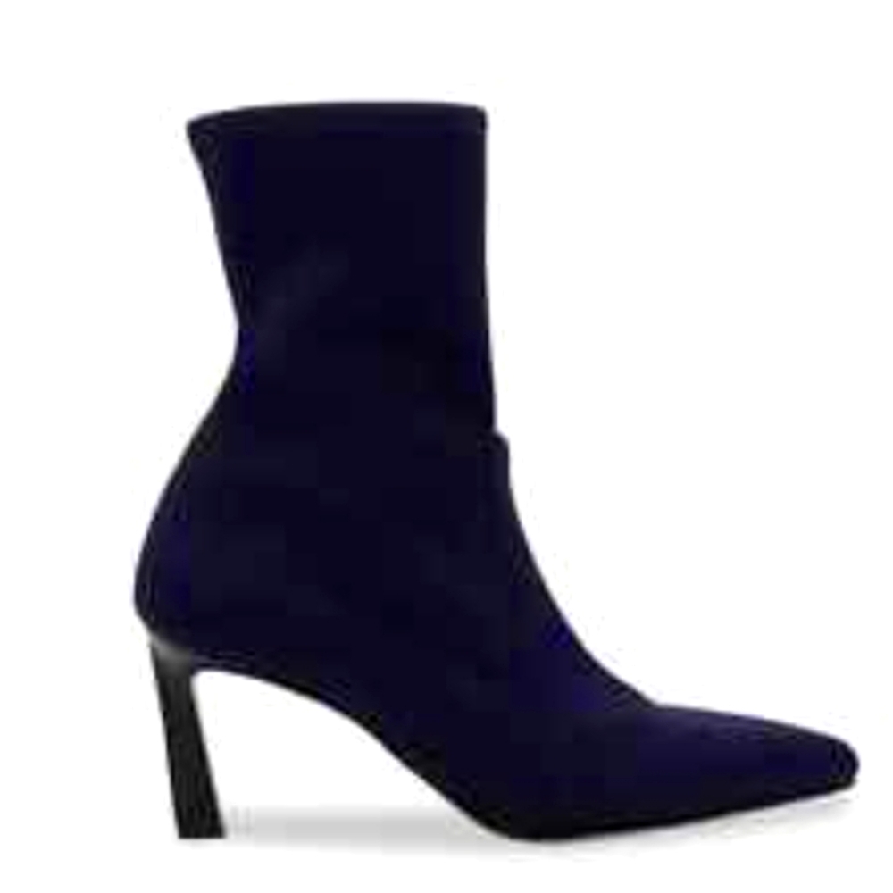 Stuart Weitzmani navy blue heeled boots.